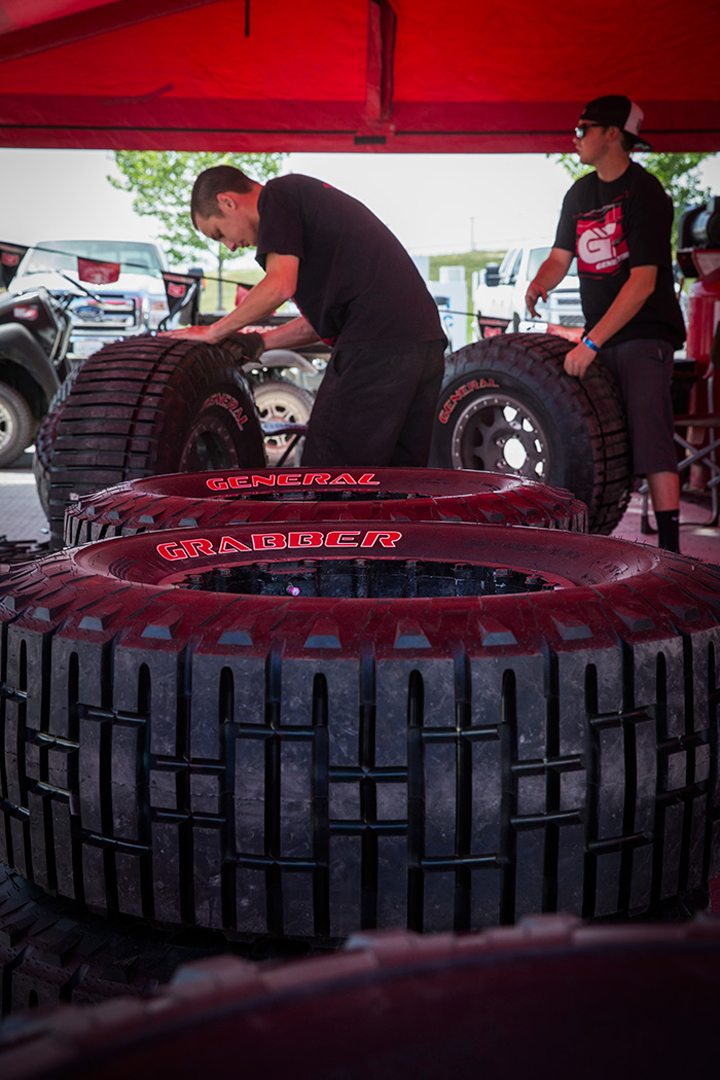 Tire grooving and cutting is done right at the race track. Why not just be prepared and do it before you get to the track? Well, different track conditions call for different grooving patterns, so a team may not know exactly how they want their race tires cut until they get to the track and see/feel the condition of it.